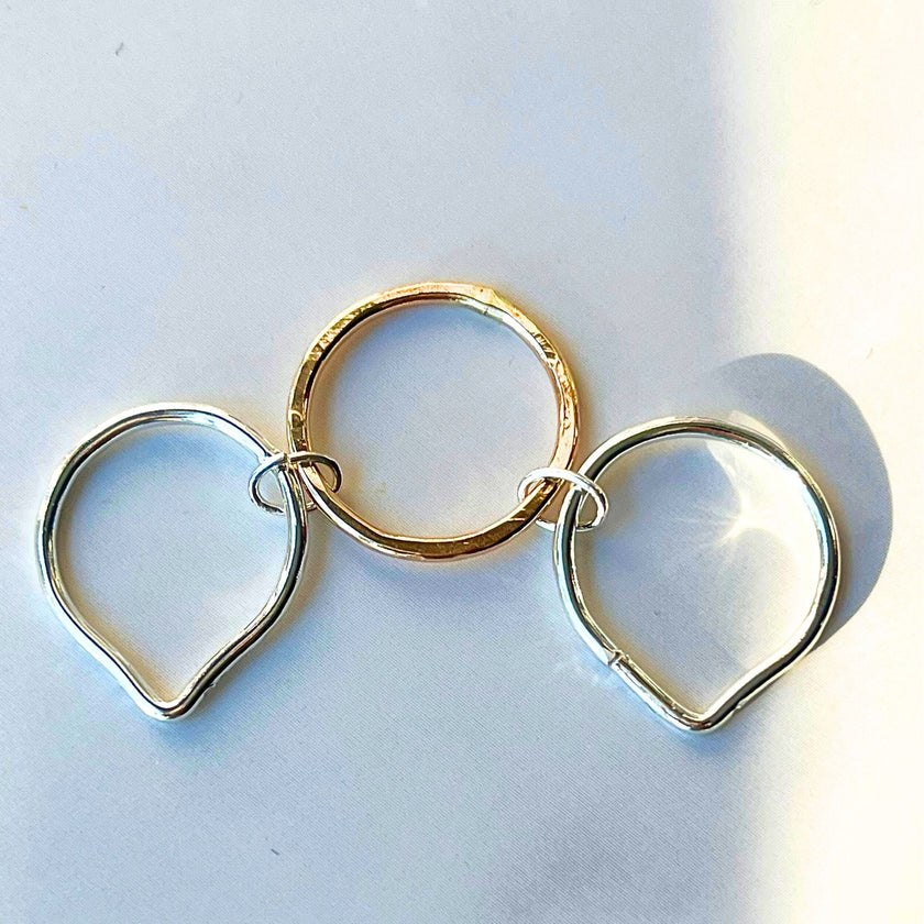 Gold and silver interlocking stacking puzzle rings made from 14K gold filled and Argentium silver