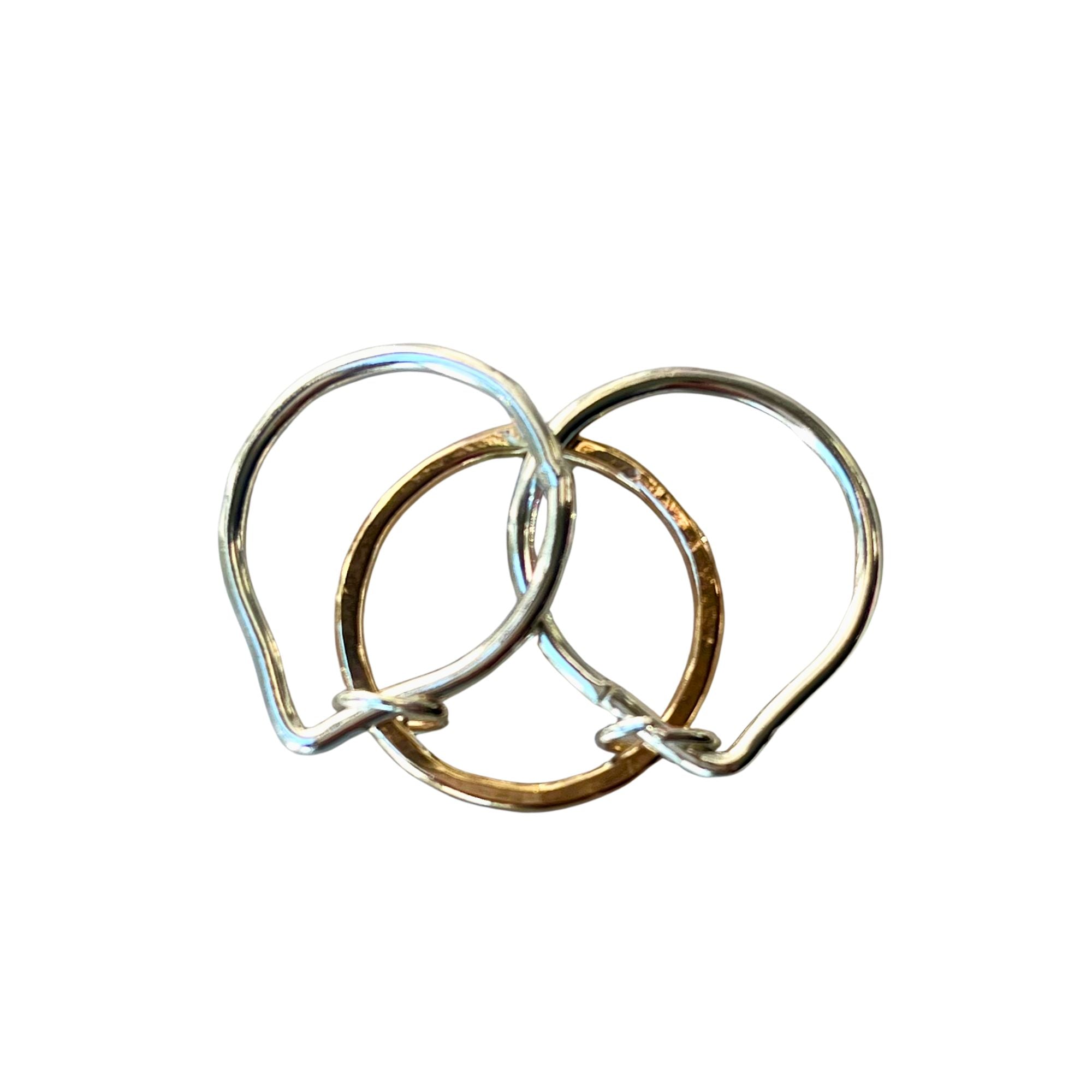 Gold and silver interlocking stacking puzzle rings made from 14K gold filled and Argentium silver